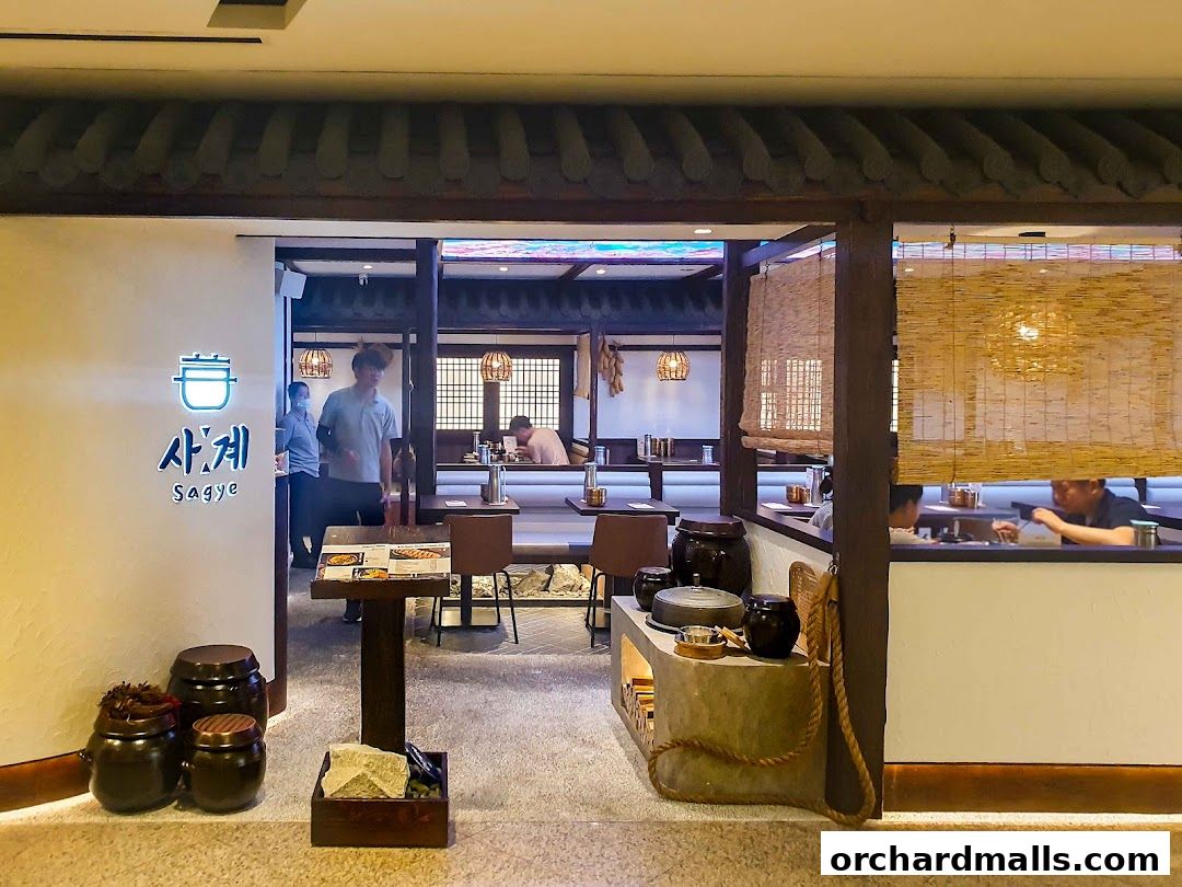 Interior view of Sagye Korean Pot Rice and BBQ restaurant with traditional decor.
