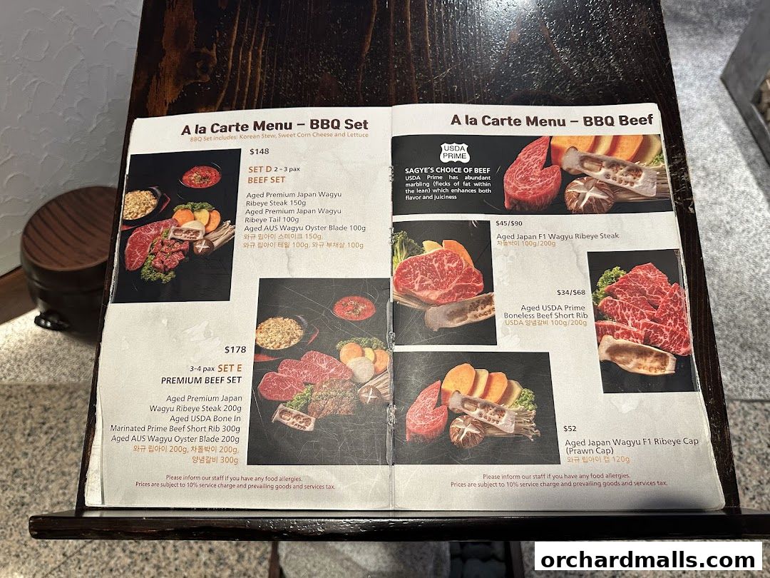 A menu showcasing various Korean BBQ beef sets and cuts with prices and descriptions.