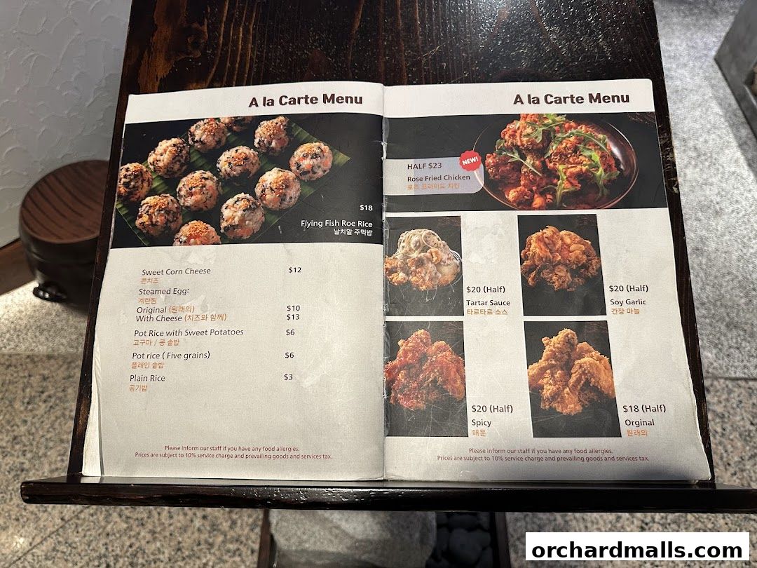 A menu featuring Korean dishes like fried chicken and pot rice with various flavors.