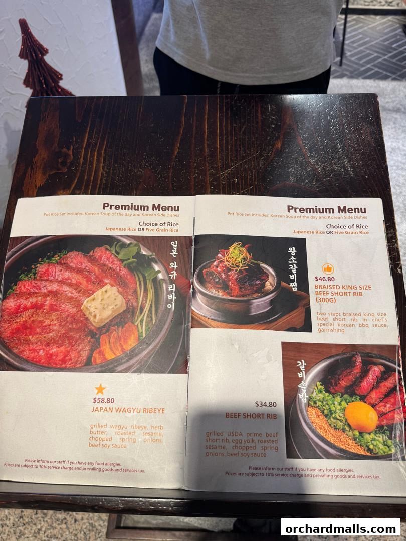 A menu featuring premium Korean dishes like Wagyu Ribeye and Braised Beef Short Rib.