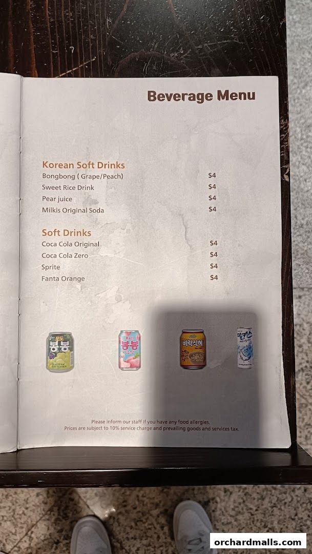 A beverage menu featuring Korean soft drinks and other popular soft drinks with prices.