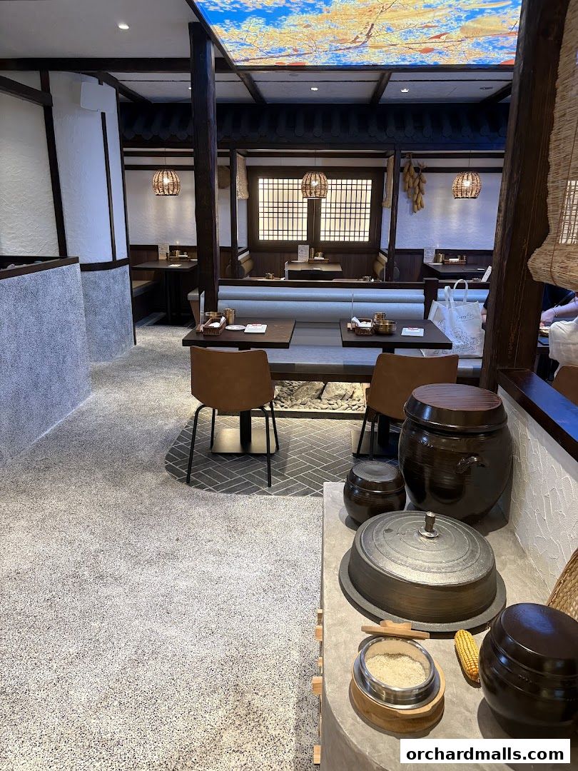 Interior of a Korean restaurant with traditional decor and seating areas.