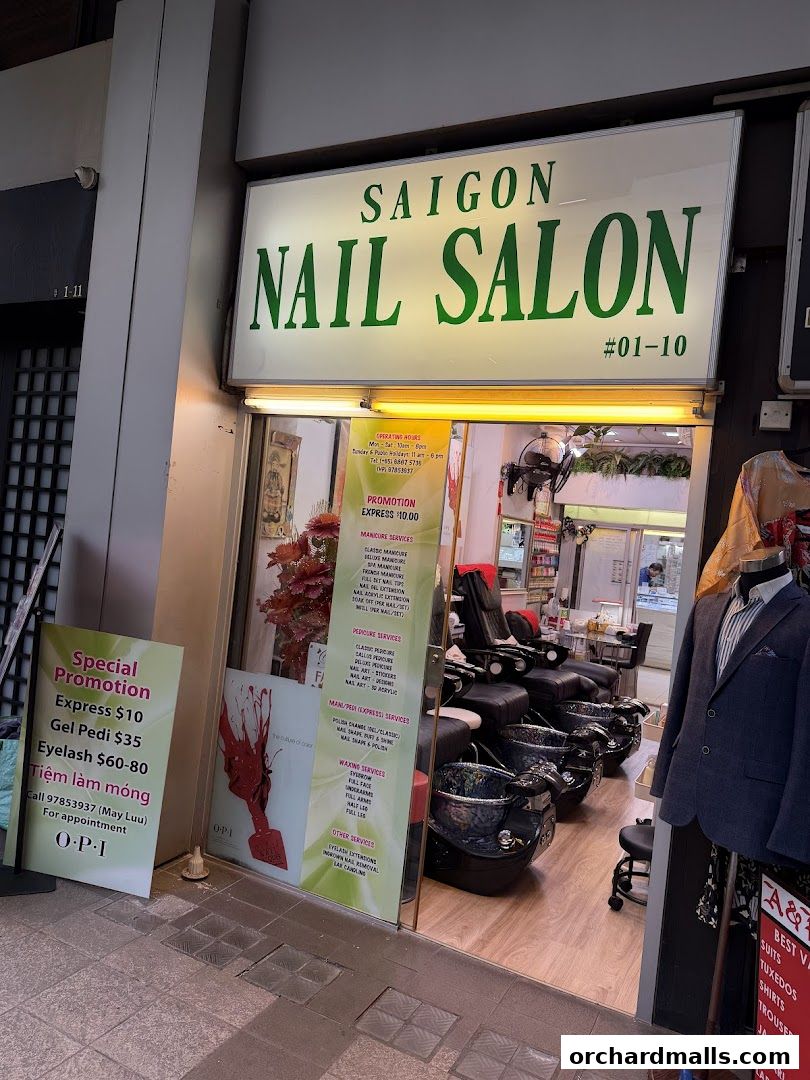 Exterior of Saigon Nail Salon with a sign, promotions, and interior view of pedicure chairs.