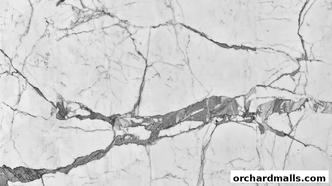 A close-up view of white marble with prominent grey veining.