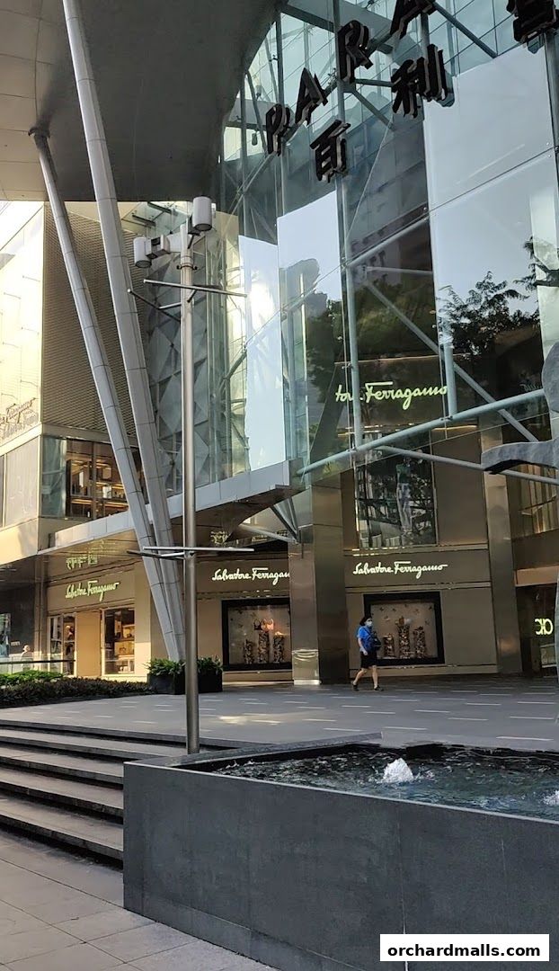 Exterior view of Salvatore Ferragamo store with elegant displays and signage.