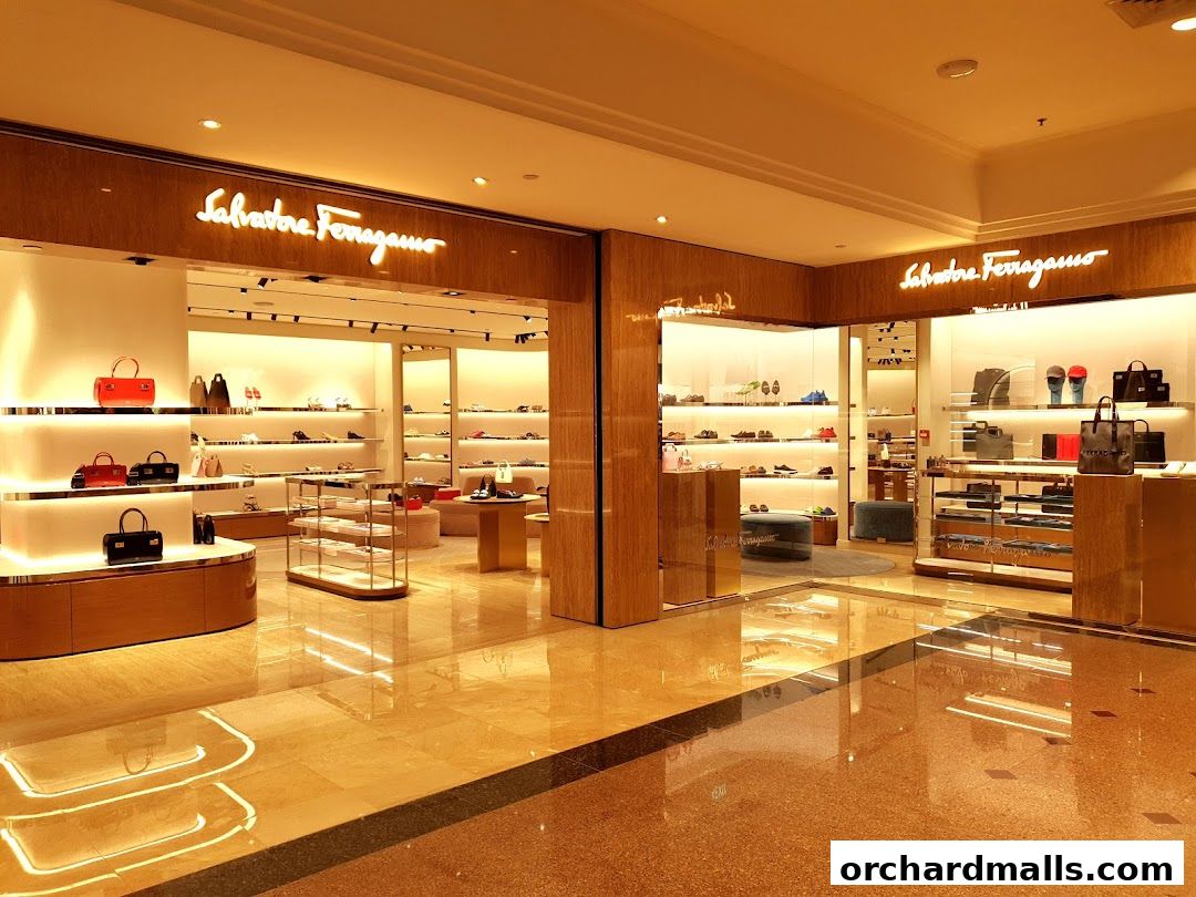 Interior view of a Salvatore Ferragamo store showcasing handbags and shoes on display.