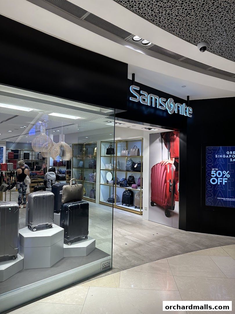 Samsonite store entrance showcasing luggage and bags with a sale advertisement.
