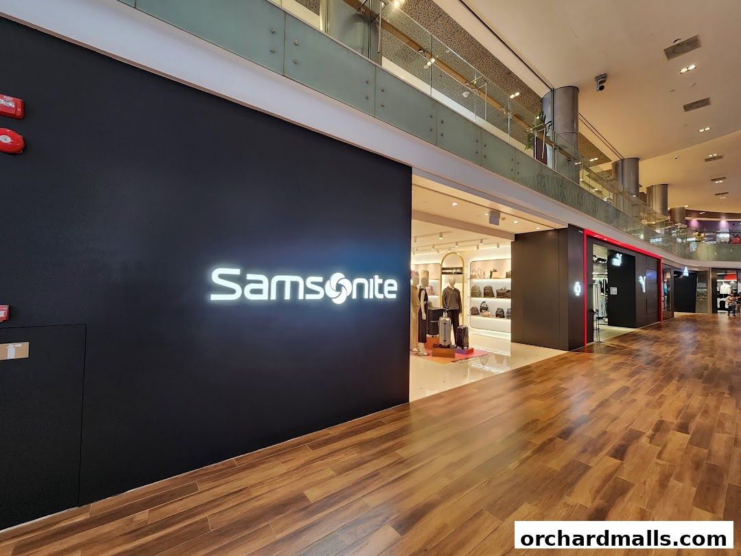 The exterior of a Samsonite store with its illuminated logo and display window.