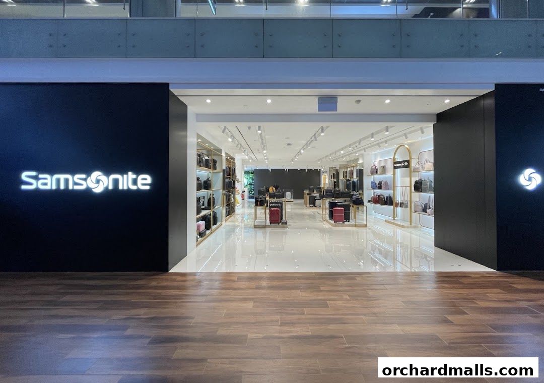 The entrance to a well-lit Samsonite store showcasing a wide variety of luggage and bags.