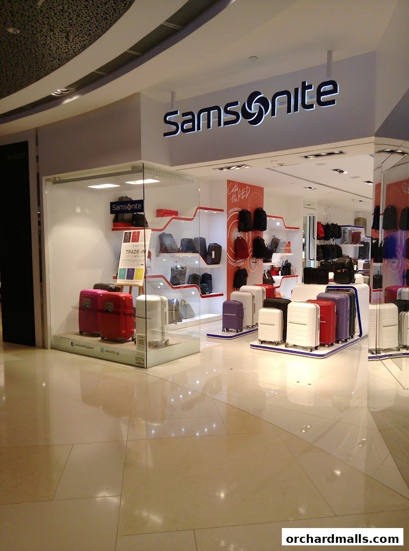 Samsonite store interior showcasing a variety of luggage and bags in different colors and styles.