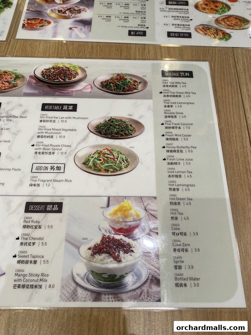 A menu featuring Thai dishes, desserts, and beverages with prices and descriptions.