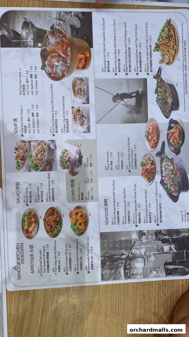 A menu from Sanook Kitchen Thai BBQ & Seafood featuring various Thai dishes with images and prices.