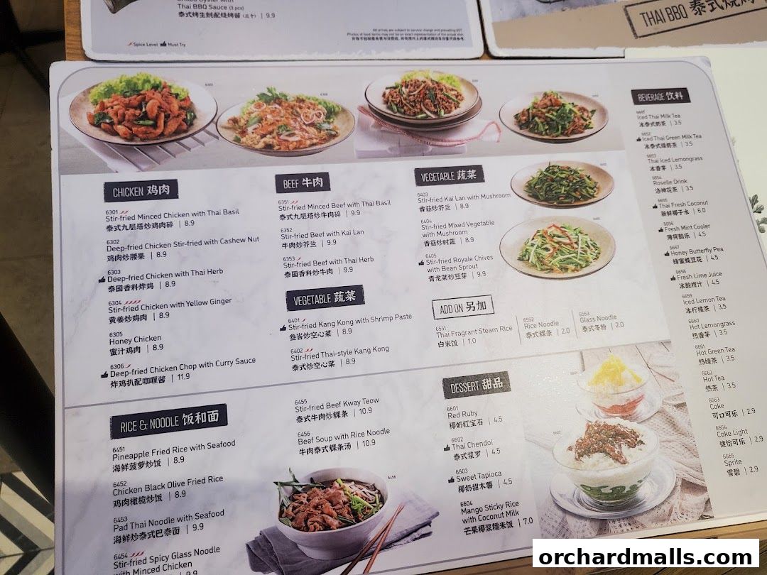 A menu from Sanook Kitchen Thai BBQ Seafood featuring various Thai dishes and beverages.