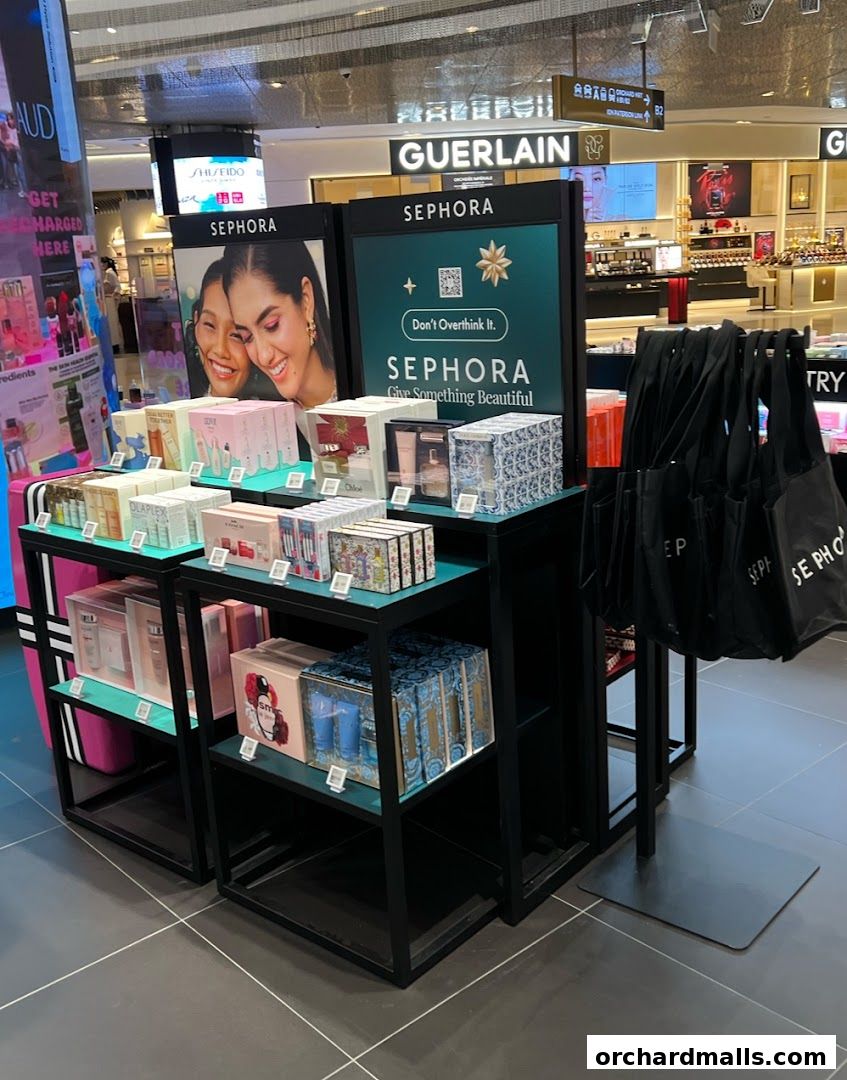 A display of various beauty products and gift sets at a Sephora store.