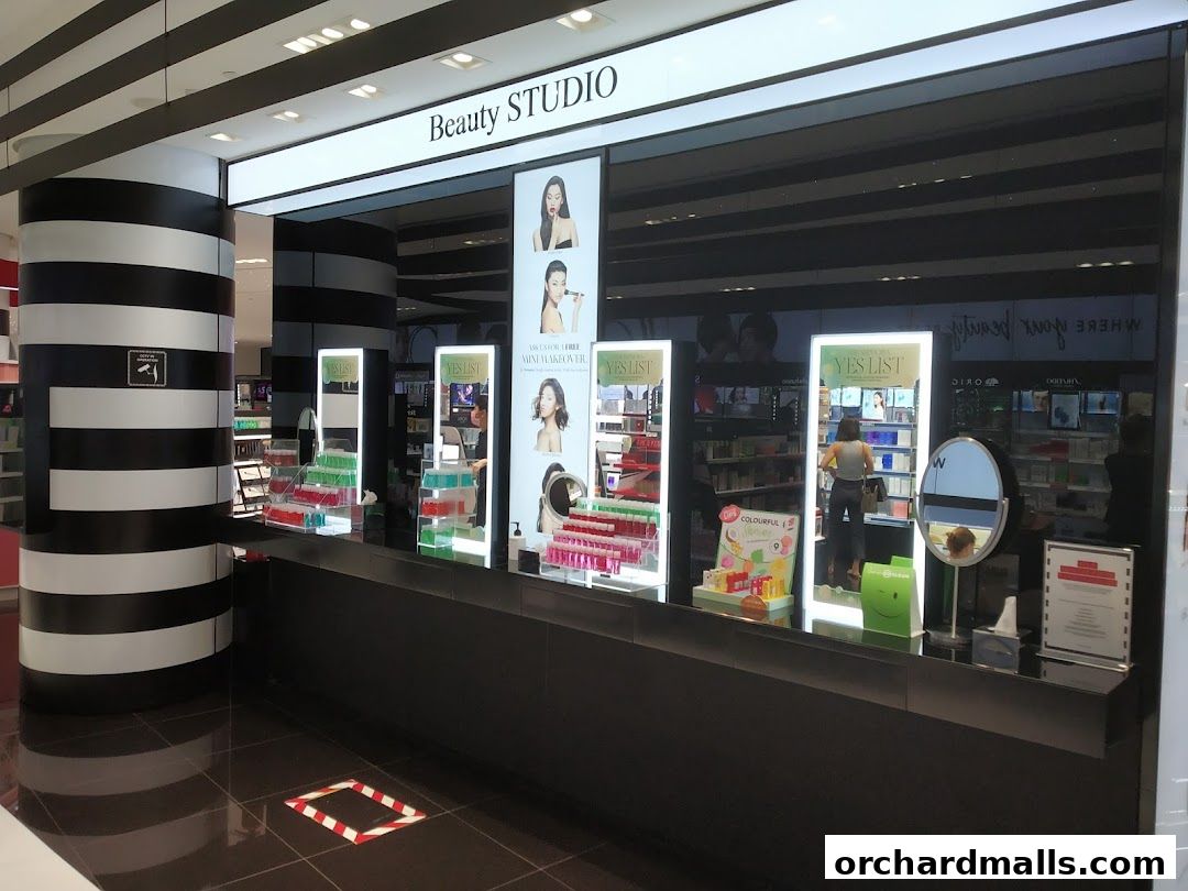 The Sephora Beauty Studio counter displays makeup products and promotional materials.