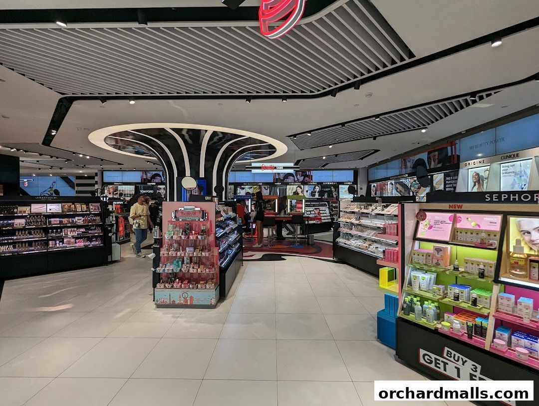 Interior view of a well-lit Sephora beauty store with various makeup and skincare products on display.