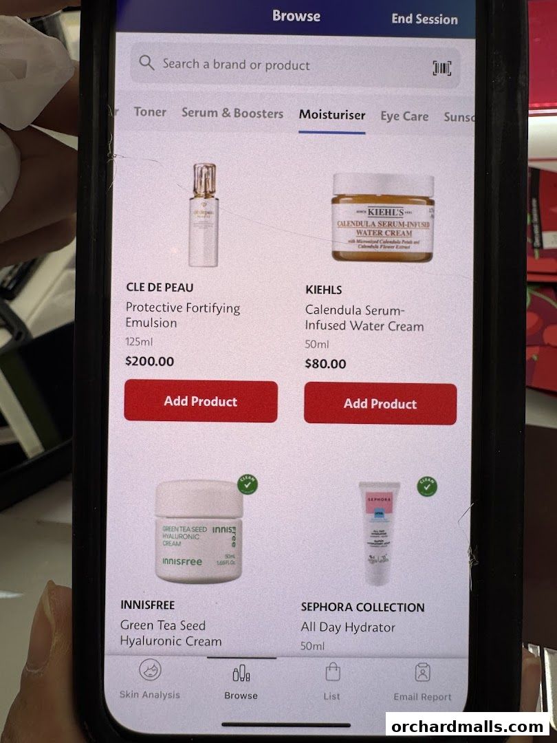 A mobile screen displaying moisturizers from various brands like Cle de Peau, Kiehl's, and Innisfree.