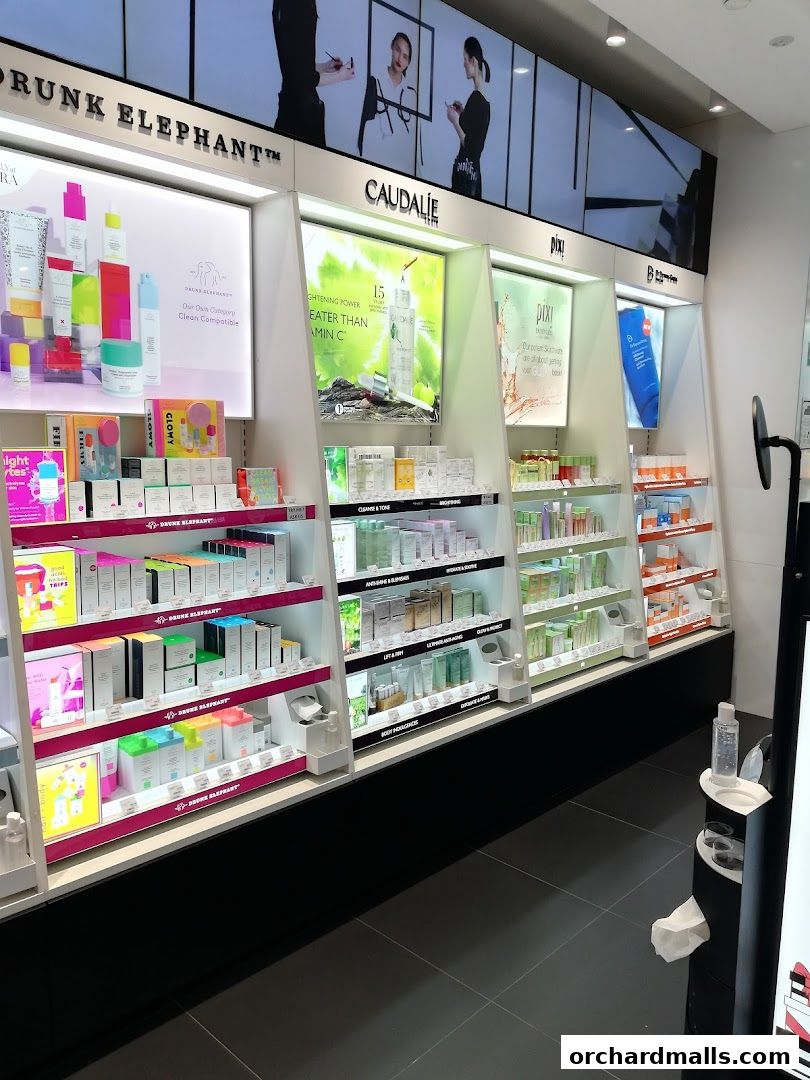 Interior view of a Sephora store showcasing various skincare brands and products on display shelves.