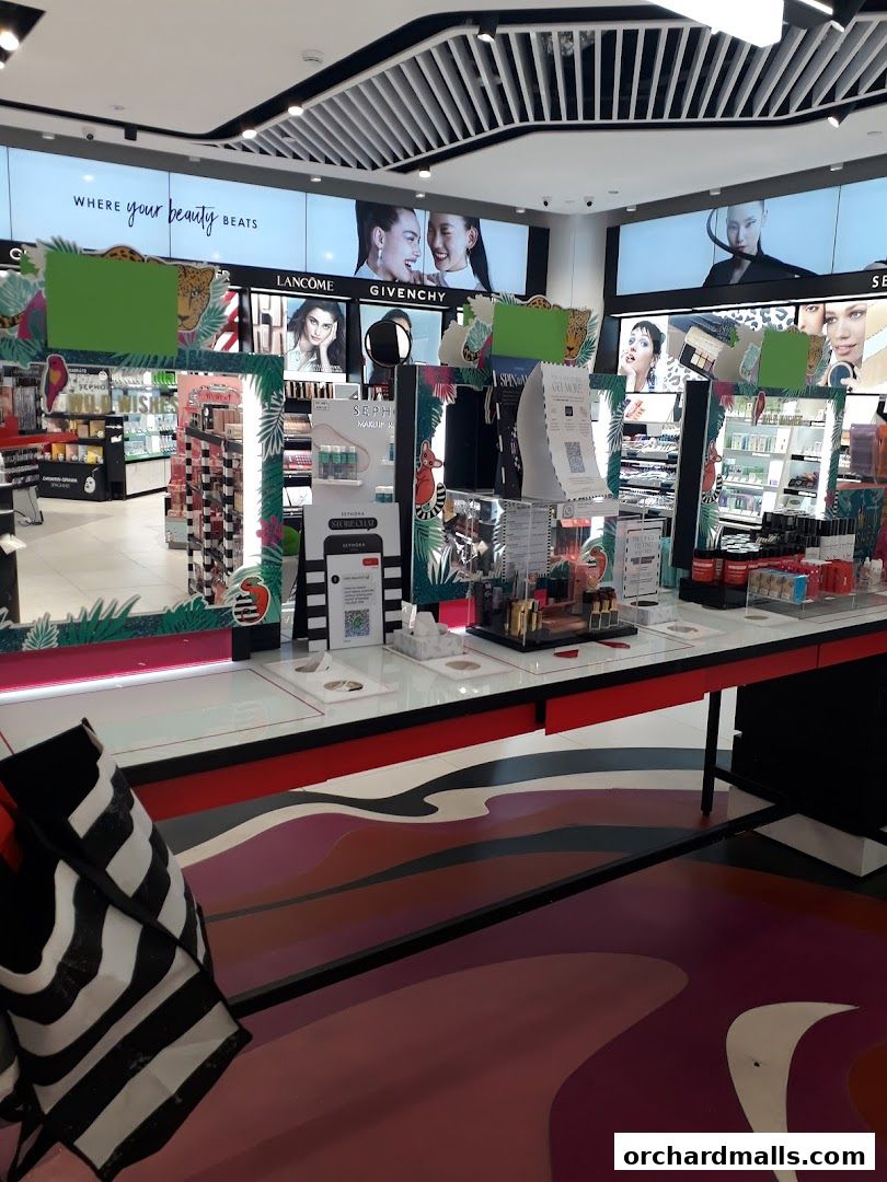 Interior view of a Sephora beauty store with displays of makeup and skincare products.