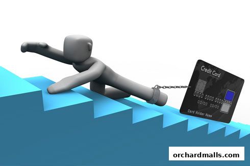 A figure struggles to climb stairs while chained to a credit card.