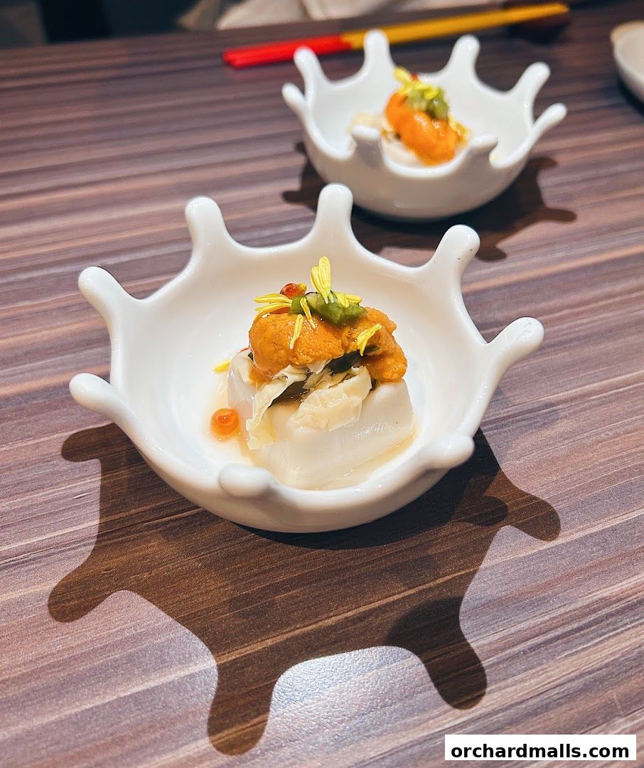 Delicate Okinawan cuisine appetizer served in a unique, crown-shaped dish.