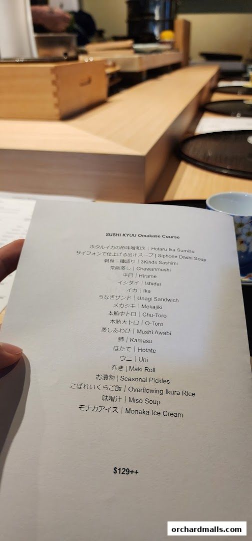 A menu for Sushi Kyuu Omakase Course with various sushi and Japanese dishes.