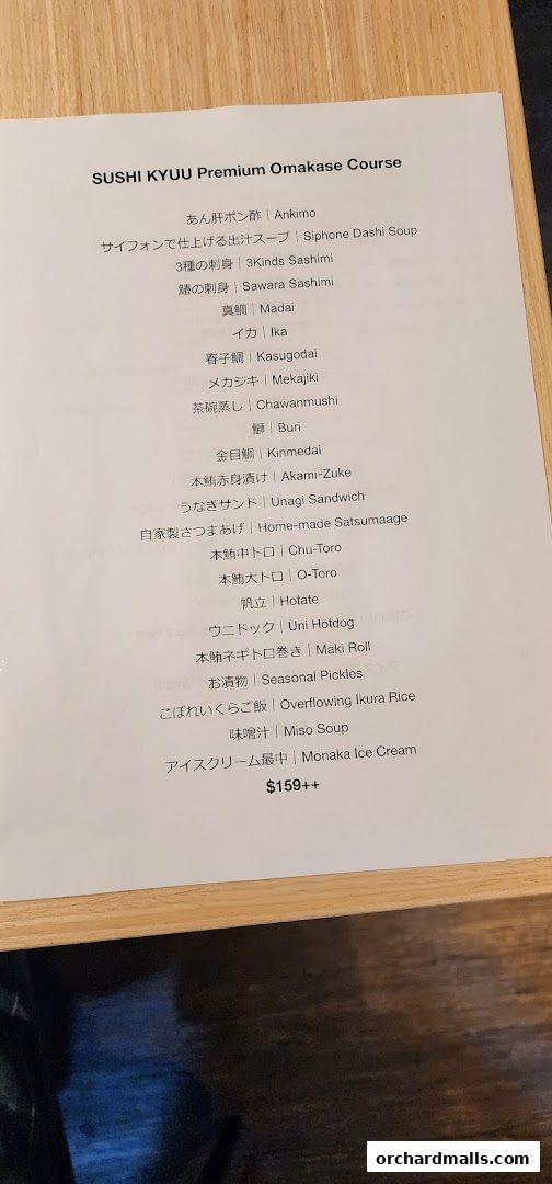 A menu for Sushi Kyuu's Premium Omakase Course with various sushi and Japanese dishes.