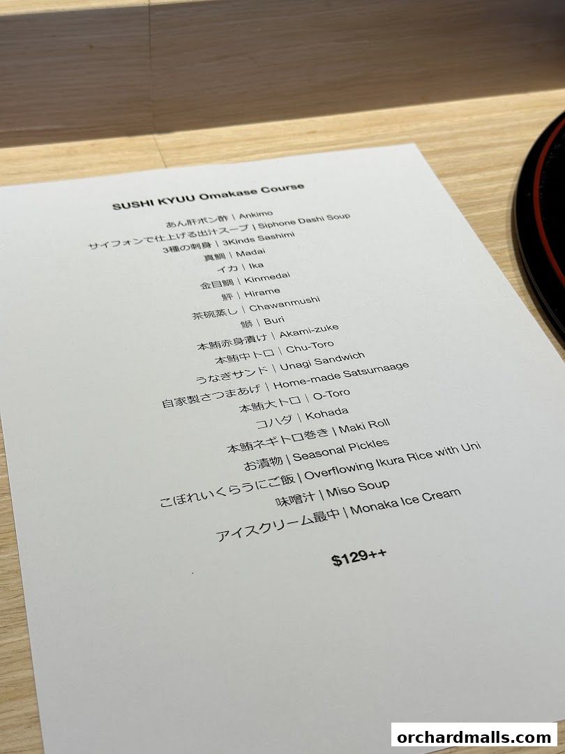 A menu for the SUSHI KYUU Omakase Course with various Japanese dishes and prices.