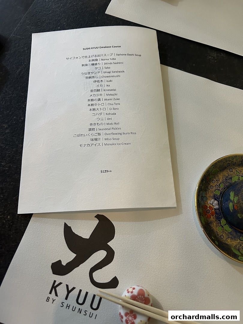 A menu for Sushi Kyuu Omakase Course with various sushi and Japanese dishes.
