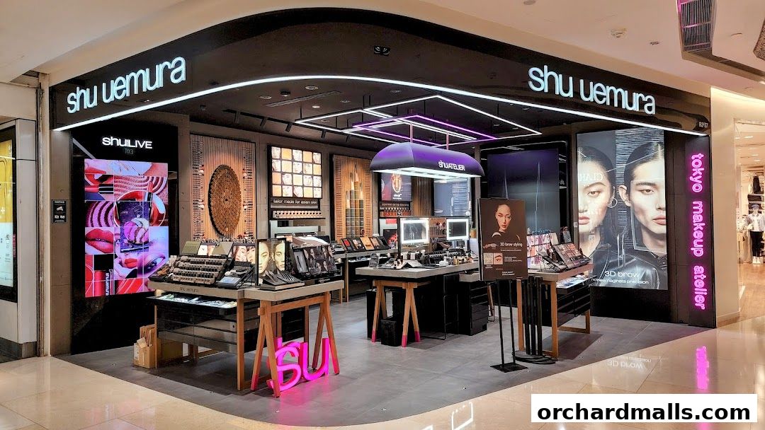 The Shu Uemura makeup store features a modern interior with product displays and digital screens.