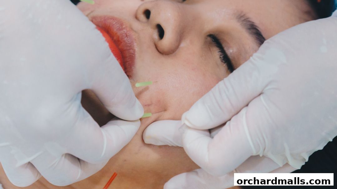Close-up of a person receiving facial acupuncture treatment.