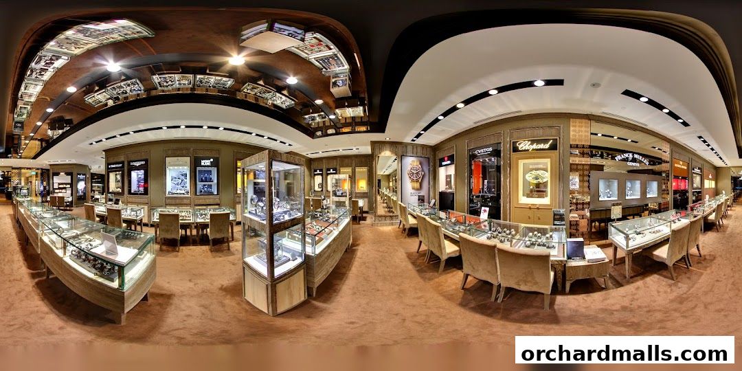 Interior view of a luxury watch store showcasing various brands and display cases.