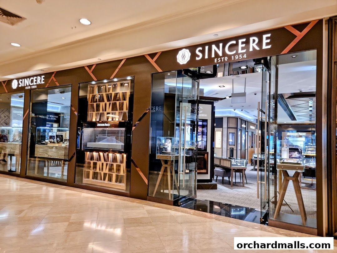 Exterior view of Sincere Fine Watches, showcasing elegant displays and entrance.