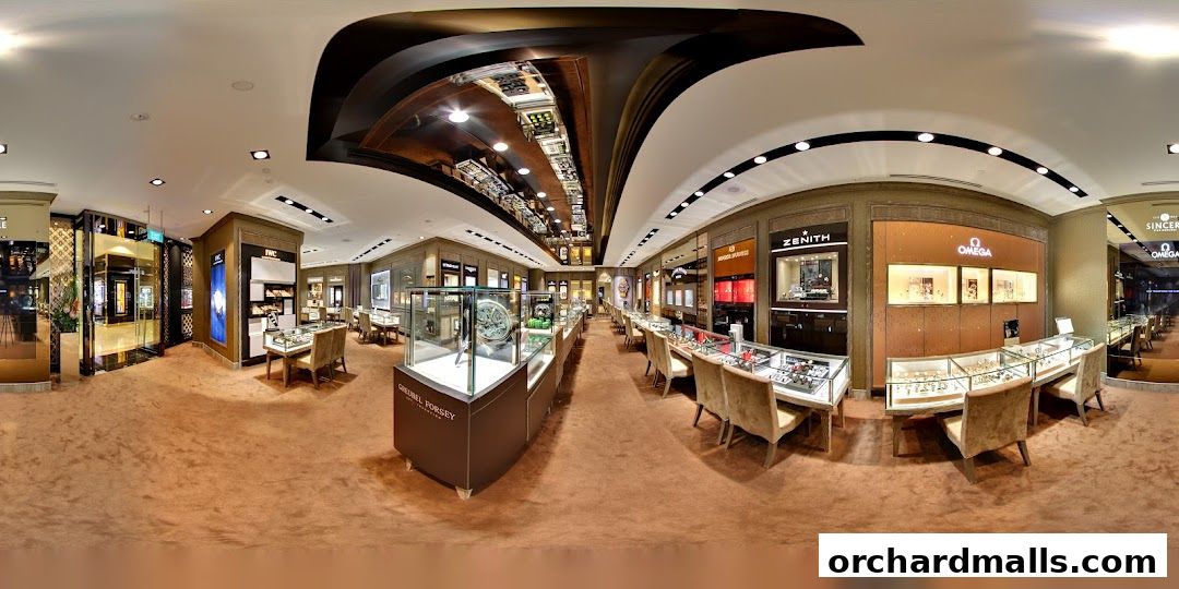 Interior view of a luxury watch store showcasing various brands and display cases.
