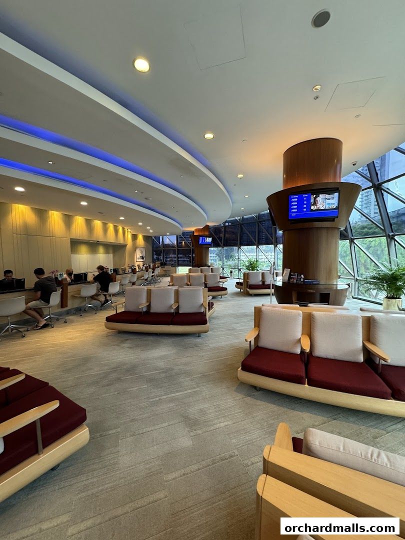 Interior of Singapore Airlines Service Centre with seating and service counters.