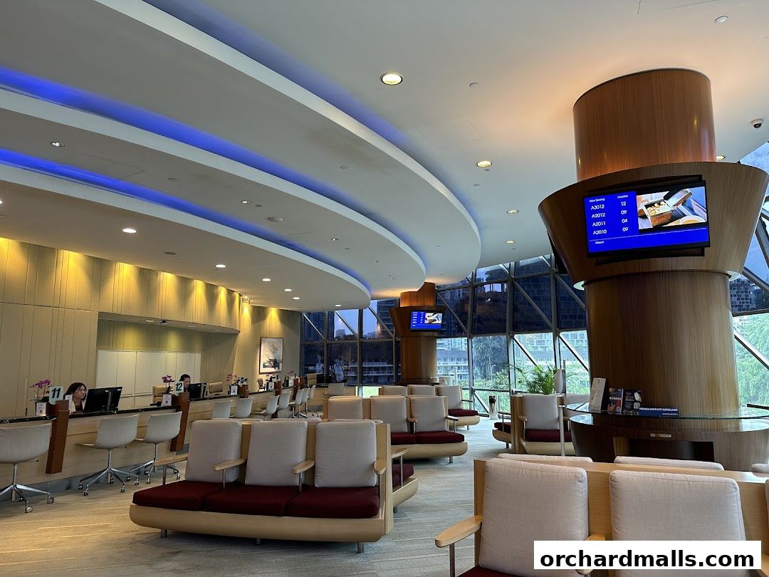 Interior of Singapore Airlines Service Centre with seating and service counters.