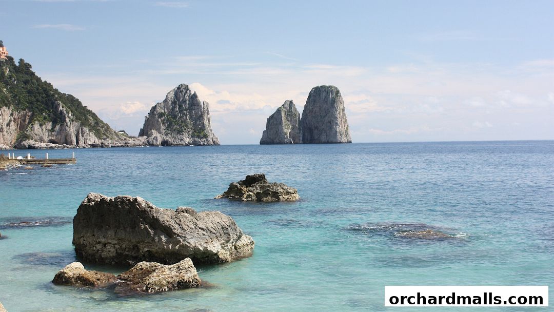 Scenic view of the Faraglioni rocks and the coastline of Capri, Italy.