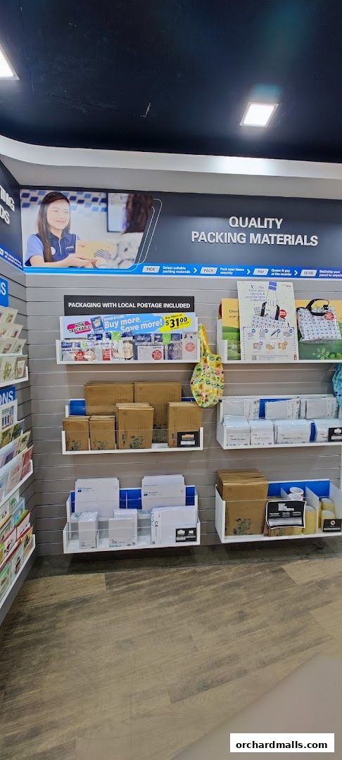 A display of various packaging materials and mailers at a post office branch.