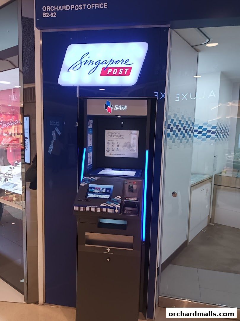 Singapore Post Orchard Branch features a self-service kiosk with a touch screen and payment options.