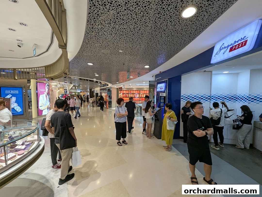 People queuing at the Singapore Post branch in a shopping mall.