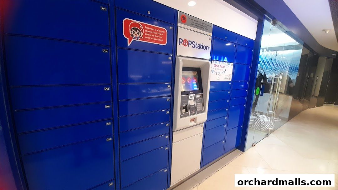 Singapore Post POPStation parcel lockers with a self-service kiosk.