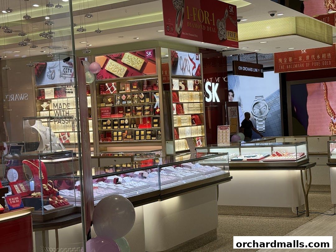 Interior view of a SK Jewellery store showcasing diamond jewelry and gold bars.