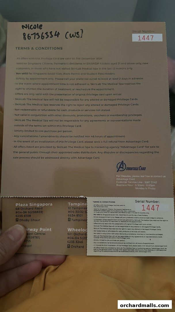 A privilege card with terms and conditions and contact information for SkinLab The Medical Spa.