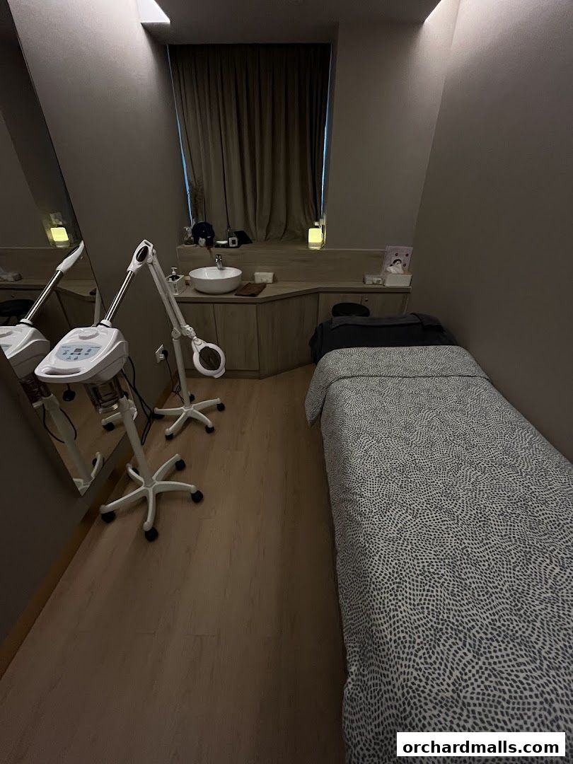 A treatment room at SkinLab The Medical Spa with a bed and spa equipment.