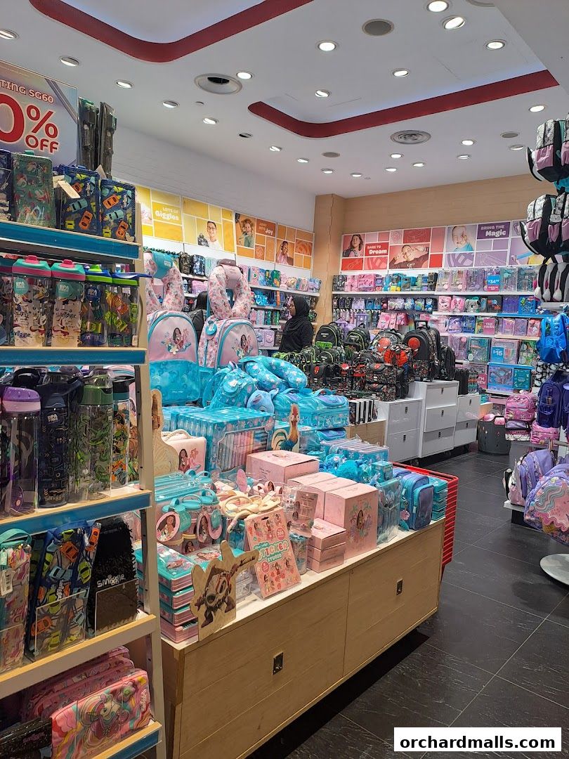 Interior view of a Smiggle store filled with colorful backpacks, stationery, and accessories.