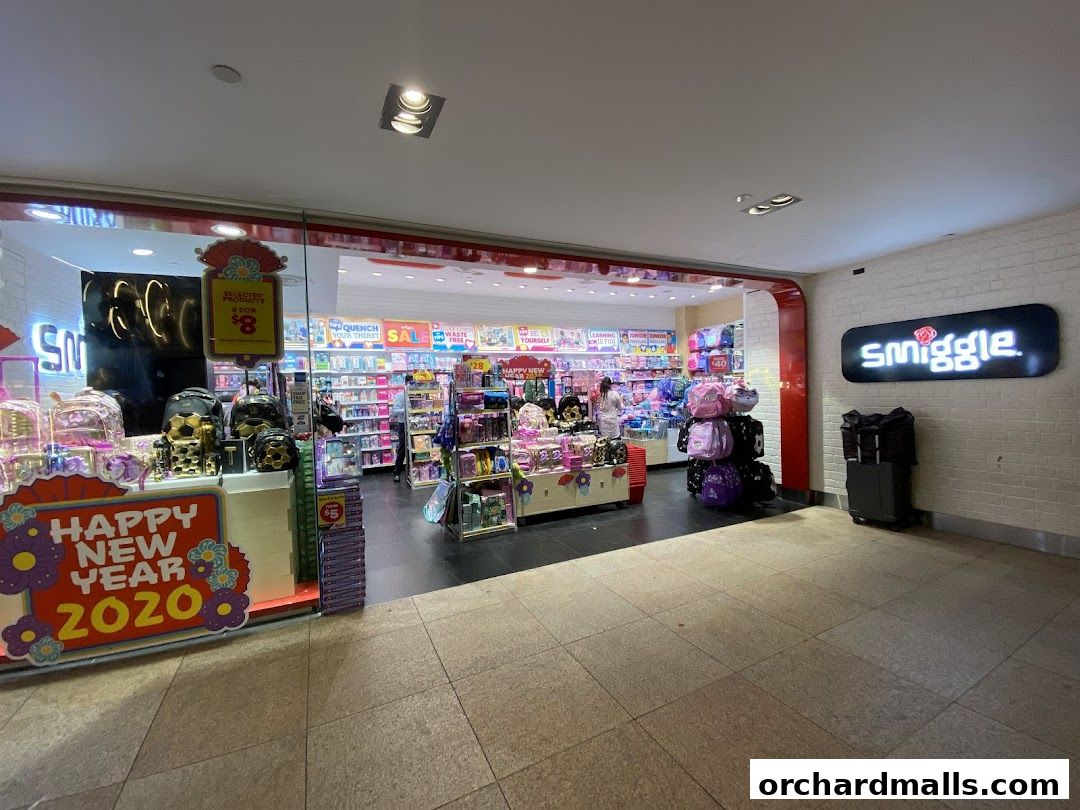 The colorful entrance of a Smiggle store, showcasing backpacks and stationery with a 'Happy New Year 2020' display.