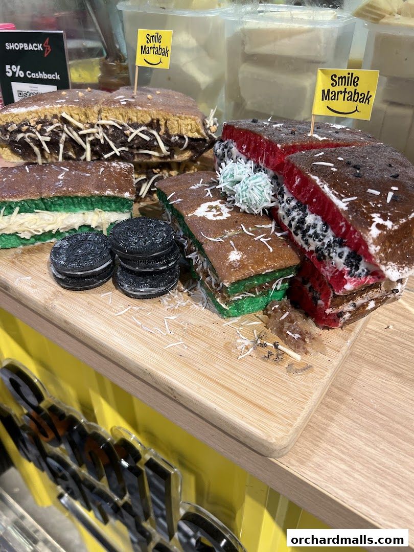 A display of colorful and decadent martabak, a popular Indonesian sweet pancake.