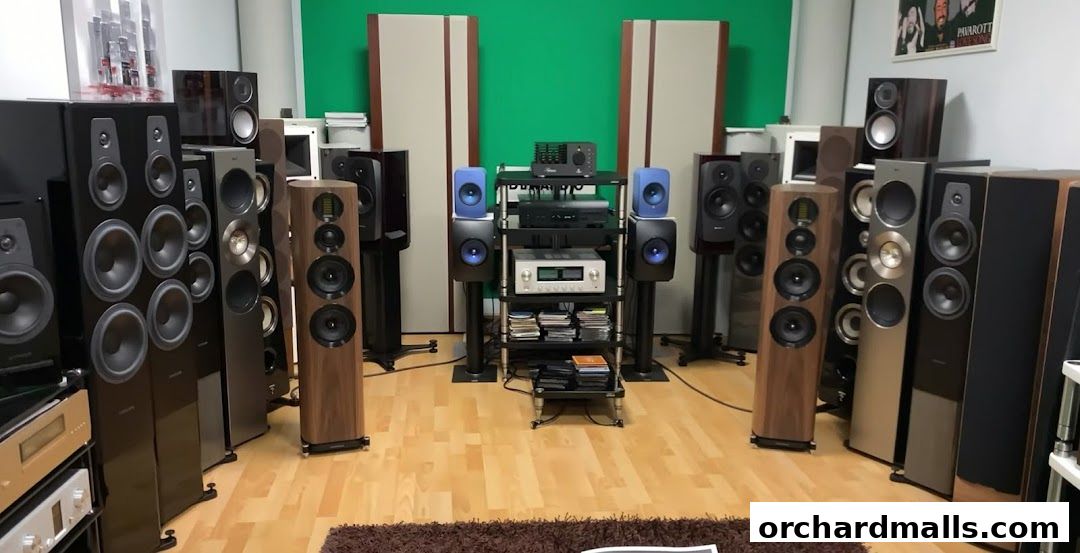 A room filled with various high-fidelity audio speakers and electronic equipment.