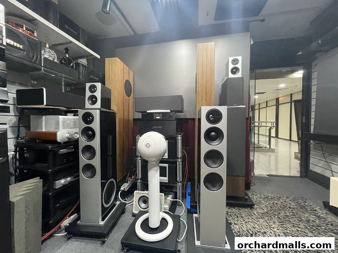 Interior of Sonic Sound Audio shop showcasing various high-fidelity speakers and audio equipment.