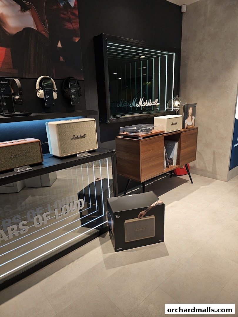 Interior of a Sonos store showcasing Marshall audio equipment and headphones.